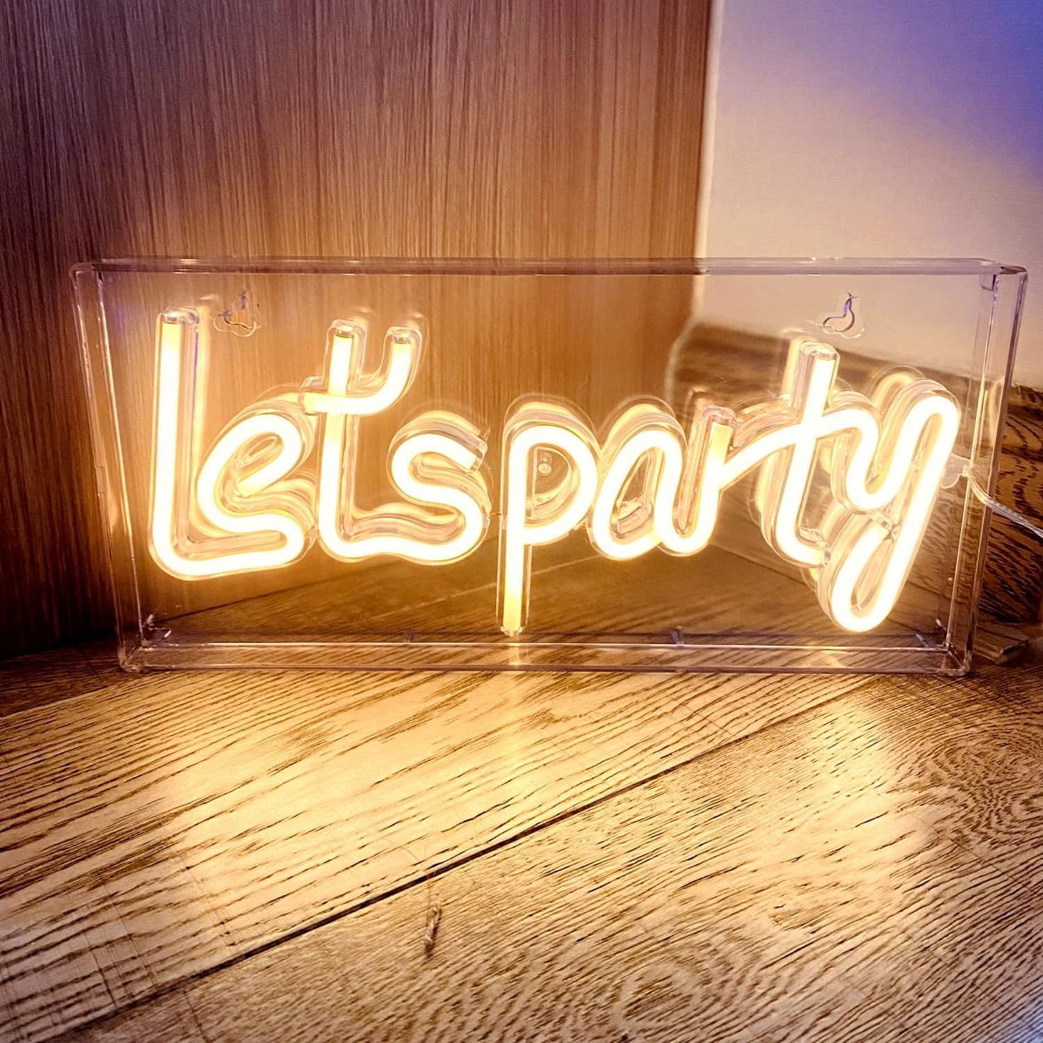 Lets party - svítící LED napis na zeď neon logo